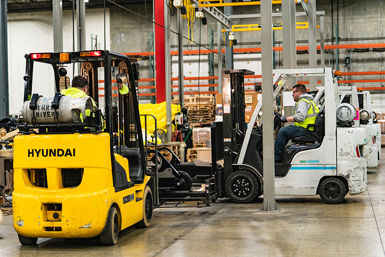 forklifts-in-warehouse-to-web